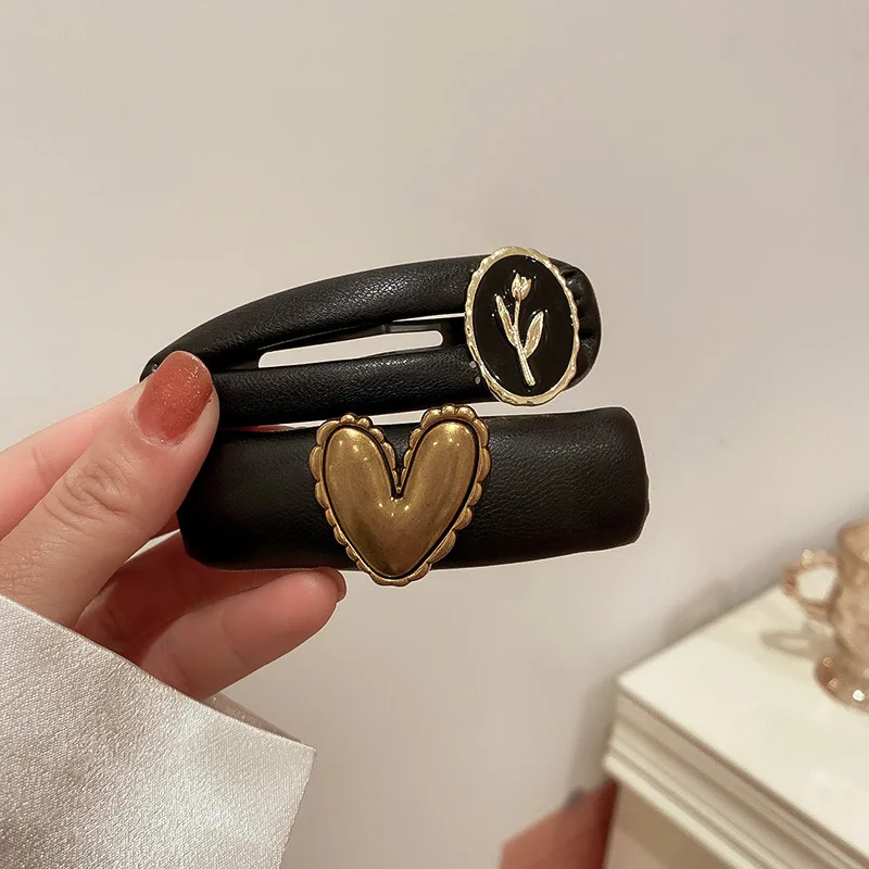 

Black drop oil flower brand leather hairpin Korean temperament retro side clip BB clip everyday versatile hair accessories