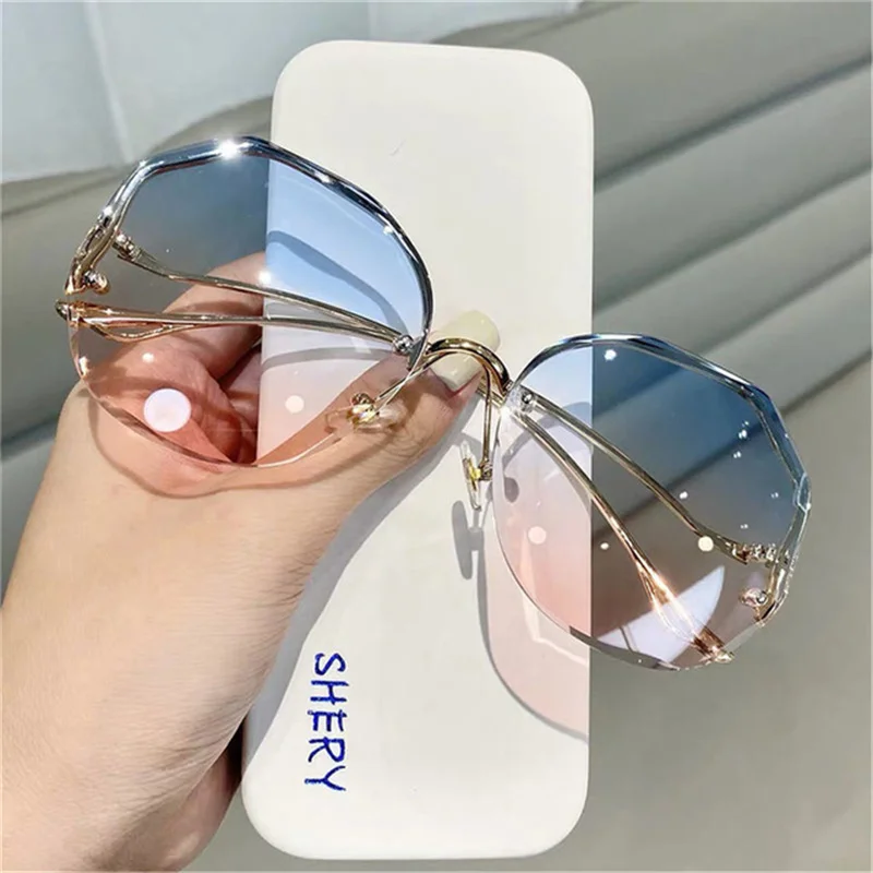 

2023 Fashion Gradient Sunglasses for Women Ocean Water Cut Trimmed Lens Metal Curved Temples Semi Rimless Sun Shades Eyeglasses