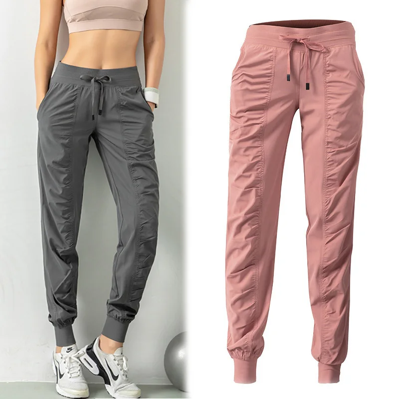 Купи Fabric Drawstring Running Sport Joggers Women Quick Dry Athletic Gym Fitness Sweatpants with Two Side Pockets Exercise Pants за 504 рублей в магазине AliExpress