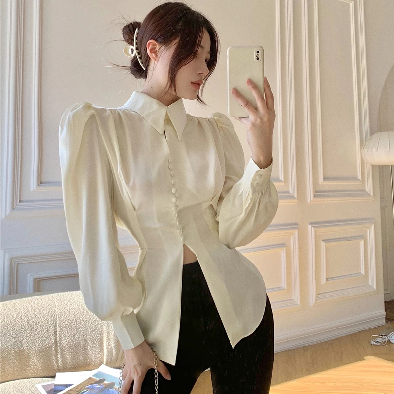 

French-style stand-up collar design sense Split-breasted shirt Minority foreign bubble sleeve strap top 123g,403-9
