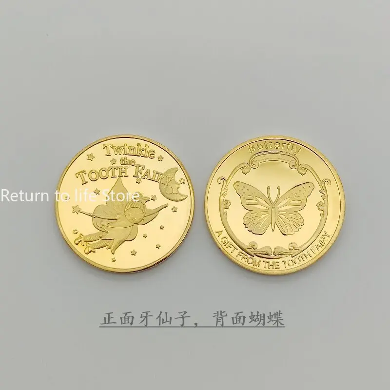 

Позолоченная коллекционная монета с зубом