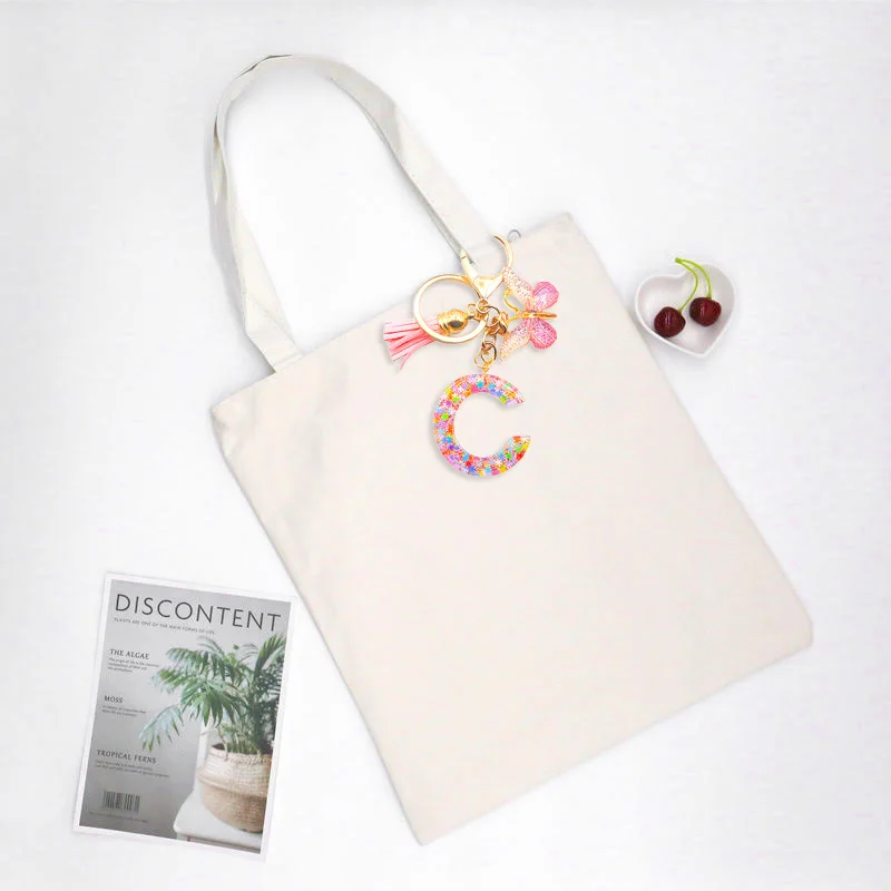 Брелок для ключей с блестками и надписью женщин