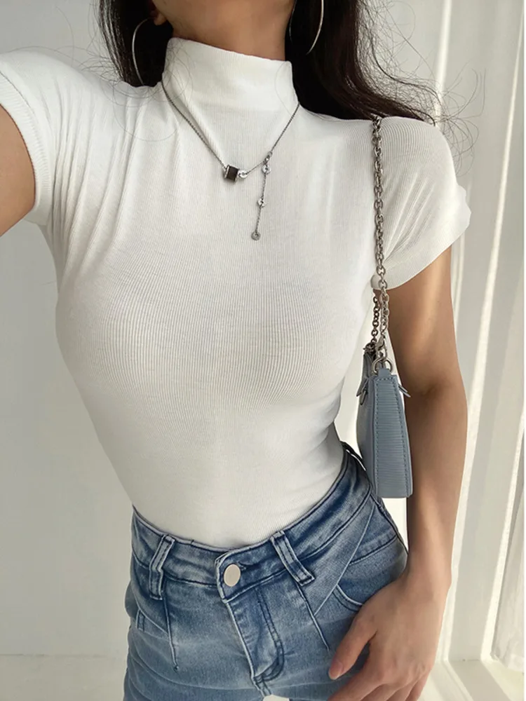 

Уличная сексуальная стильная трендовая женская футболка WOMEGAGA с коротким рукавом и высоким воротником, Женский однотонный тонкий короткий ...