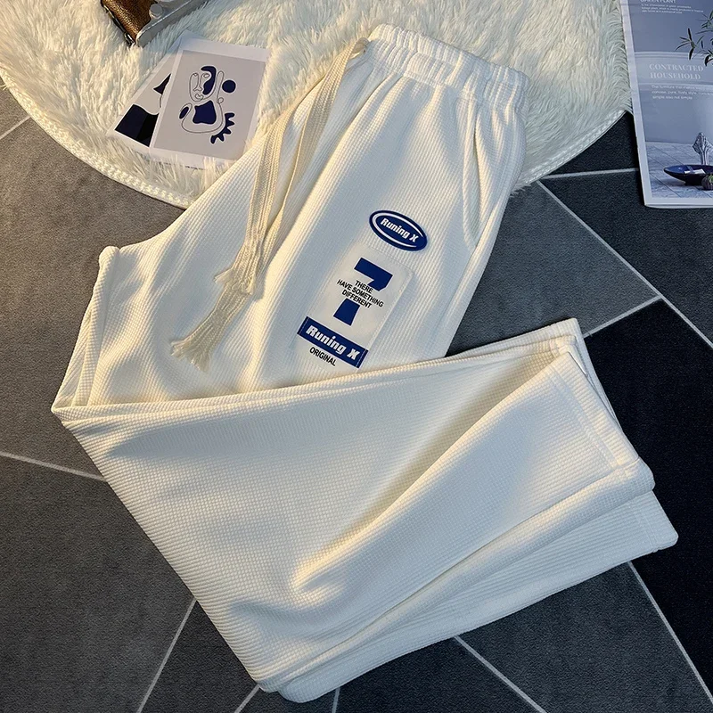 Новинка весна-лето 2023 штаны для бега с вафельным узором мужская мода брендовые