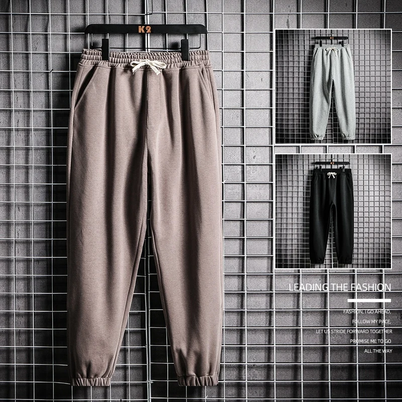 

2022 Spring Summer New Pocket Drawstring Casual Trousers Fitness Sportswear Solid Color Joggers Casual Trousers Joggers Pants