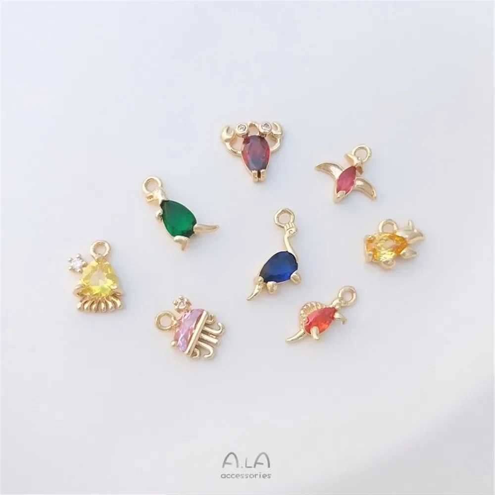 14-каратное золото инкрустированное цветными циркониевыми динозаврами морские