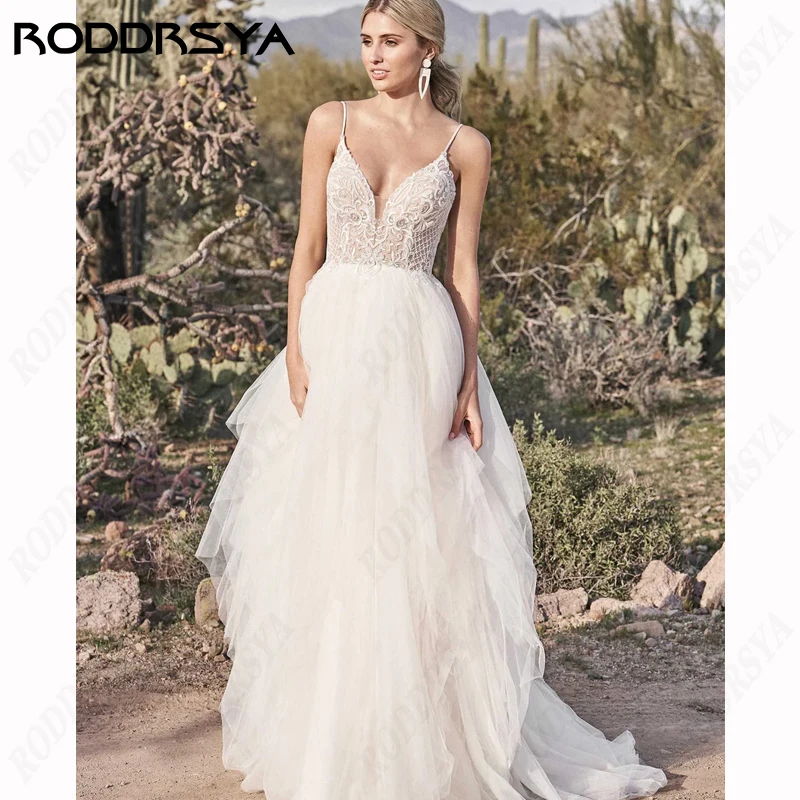 

RODDRSYA Spaghetti Straps Wedding Dress Sweetheart Lace Appliques Vestido De Noiva A-Line Tulle Illusion BacklessBride Party