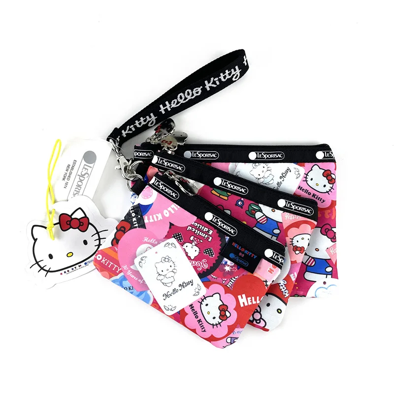 

Sanrioed Hellokittys Cute Women's Bag Fashion Cartoon Printing Hand-held Wrist Bag Three-in-one Cosmetic Storage Bag