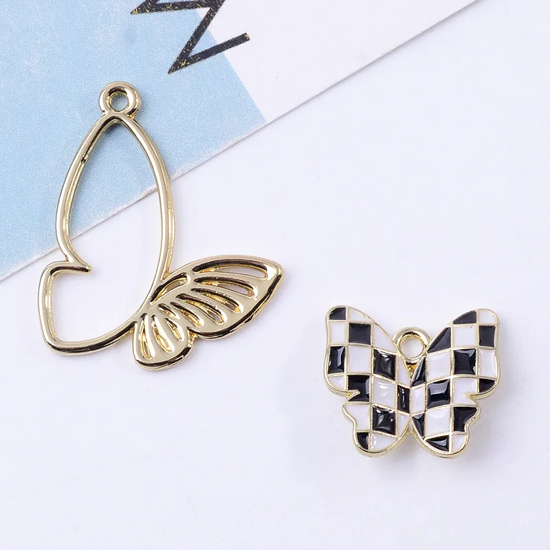

50pcs Gold color New fashion Alloy Material Enamel Butterfly Shape Hollow Butterfly for DIY Handmade Jewelry Making wholesale