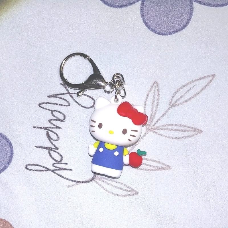 Фото Оригинальный лицензионный брелок-подвеска Sanrio с Куроми и Хеллоу Китти, милый силиконовый аниме-шарм для сумок, кошельков и ключей. №3