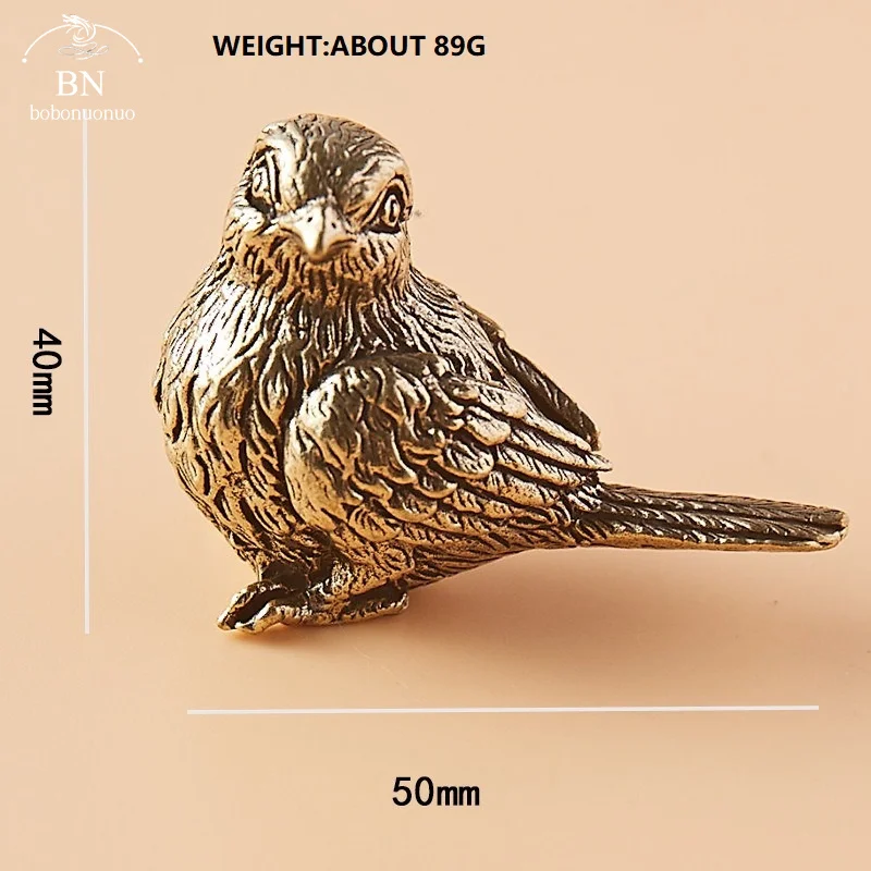 

Медная статуэтка воробья