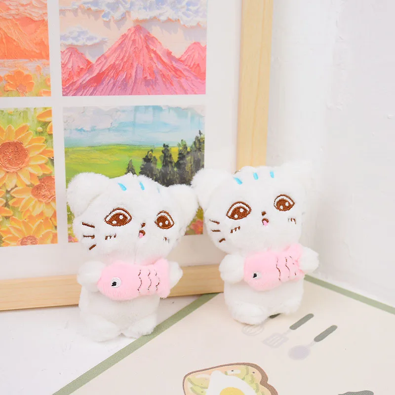 

new Cartoon cute holding fish kitten plush pendant creative cute cat funny doll Exquisite fashione soft decorate couple gift