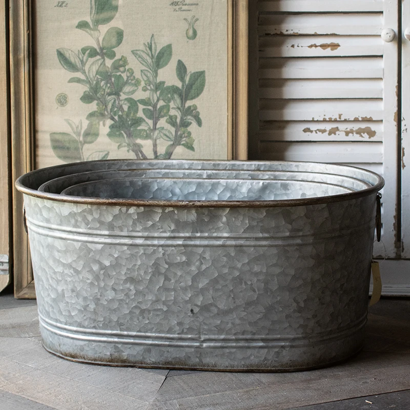 

Vintage Metal Handicraft Oval Planter Pots Set of 3