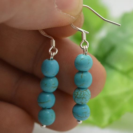 Серьги-подвески из серебра пробы с голубой бирюзой