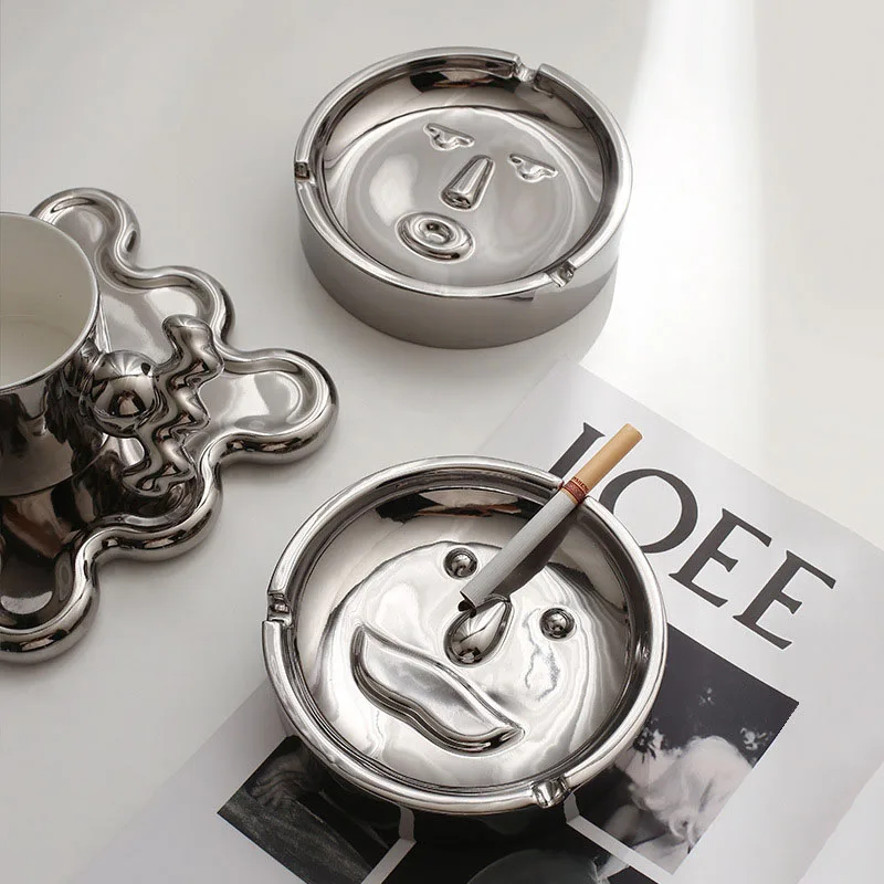 

Nordic simple Japanese-Korean light luxury home decora ceramic expression ashtray creative silver-plated face ashtray ornaments