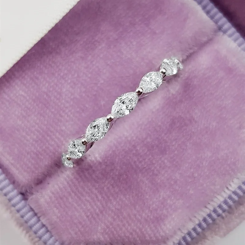 

Sparkling Silver Collor Princess Cut inlaid with a whole circle of horse eye mosang stone cubic zirconia ring