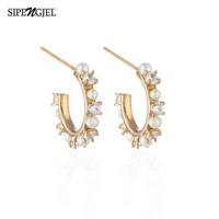sipengjel fashion gold silver color circle pearl earrings for women simple geometric round stud earrings party jewelry