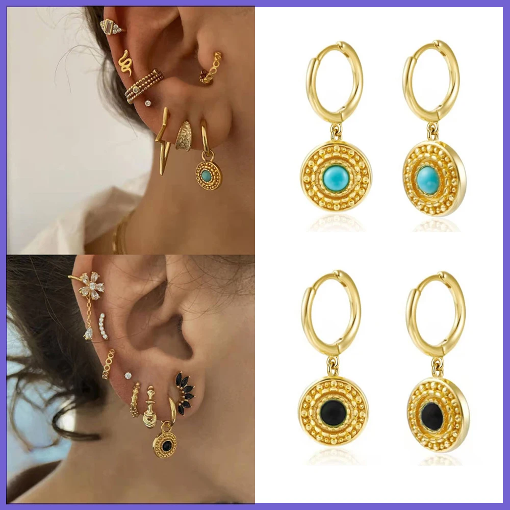 

Серьги-кольца женские серебристого цвета с зеленым Цирконом