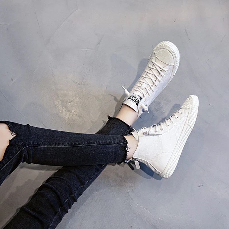 

Женские высокие кроссовки из натуральной кожи, на вулканизированной подошве