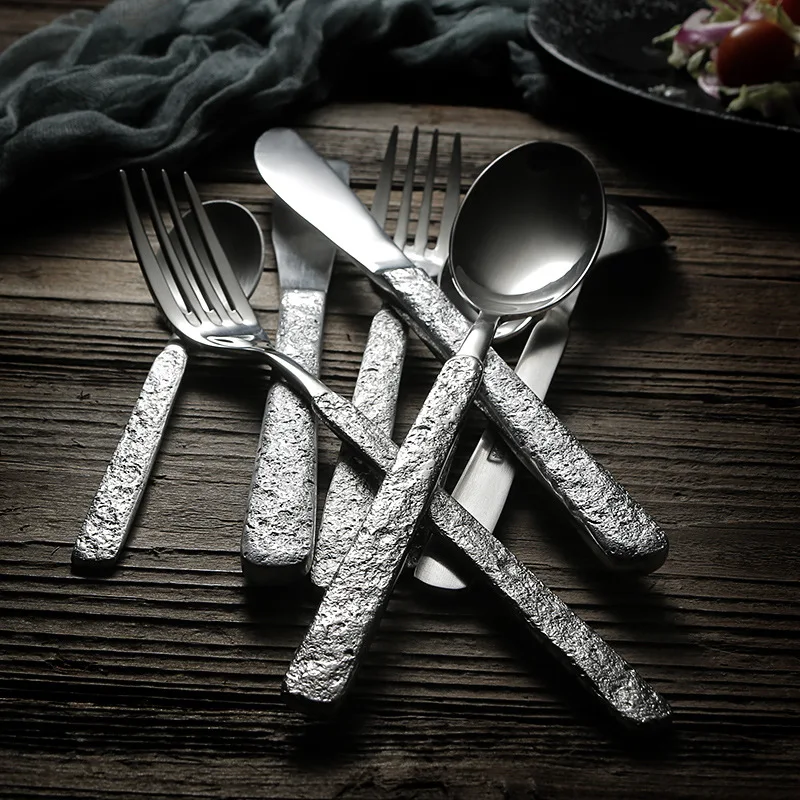

-Vintage 304 Stainless Steel Dinnerware Set with Creative Single-sided Imitation stone Grain Handle Knife Fork Spoon Set