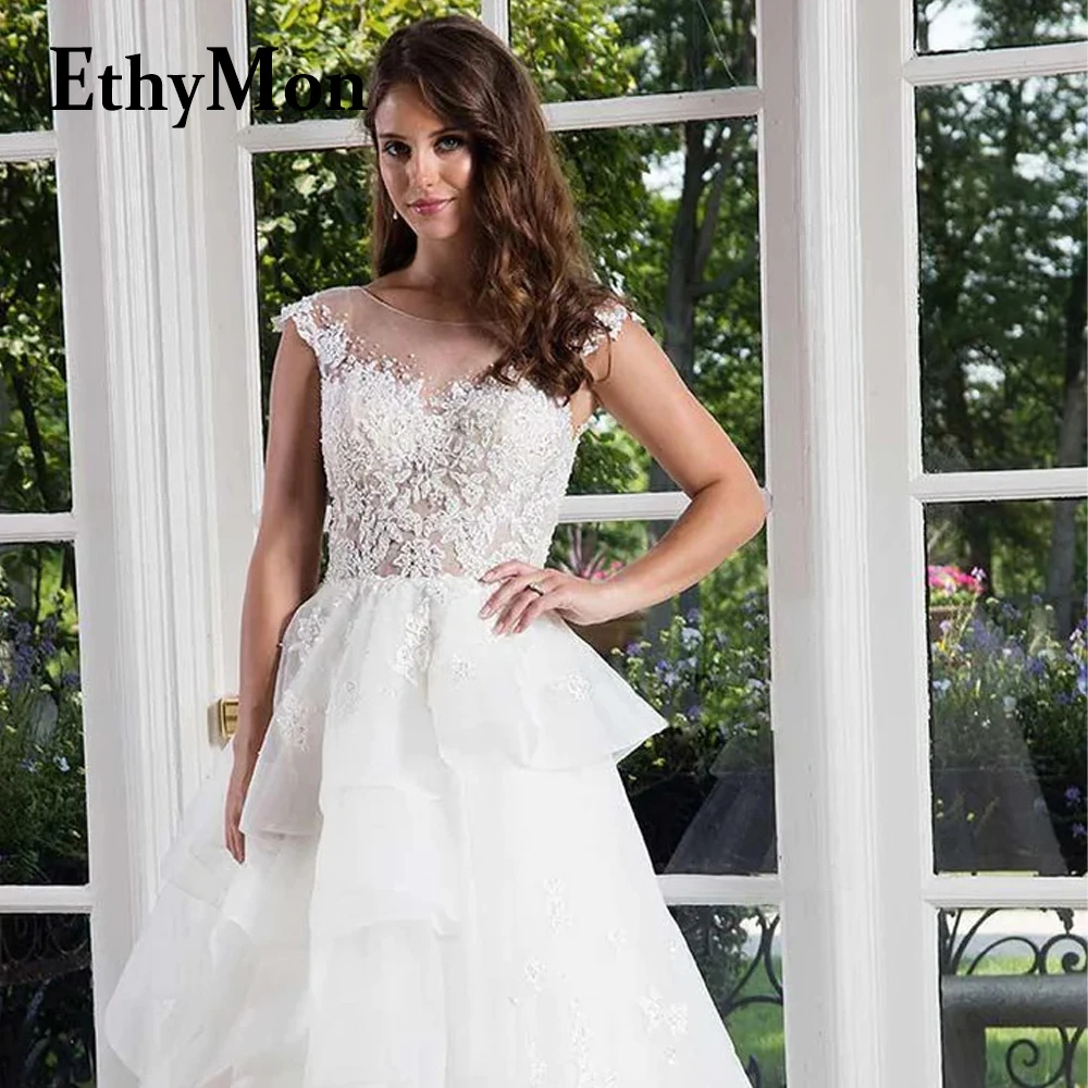 

Этимон Овальный без рукавов бисером на бретелях многоярусные Свадебные платья для женщин Vestidos De невесты индивидуальный стиль