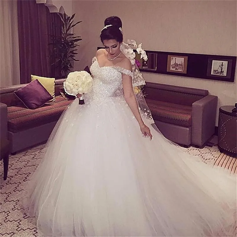 

Elegant Princess Wedding Dresses 2023 Sweetheart Backless Ball Gown Beads Tulle Chapel Train Bridal Gowns Vestido de noiva