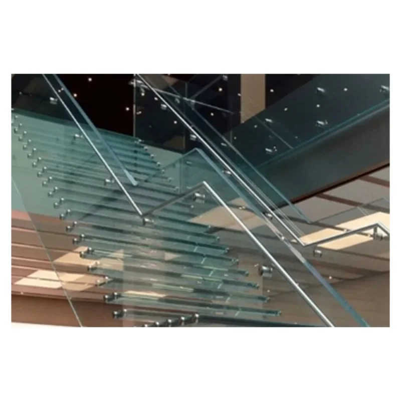 Фото Архитектурная двухсторонняя лестница с панелями из матовой нержавеющей стали и стекла. №2