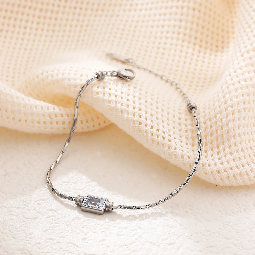 Женский браслет из нержавеющей стали с кристаллами и фианитами