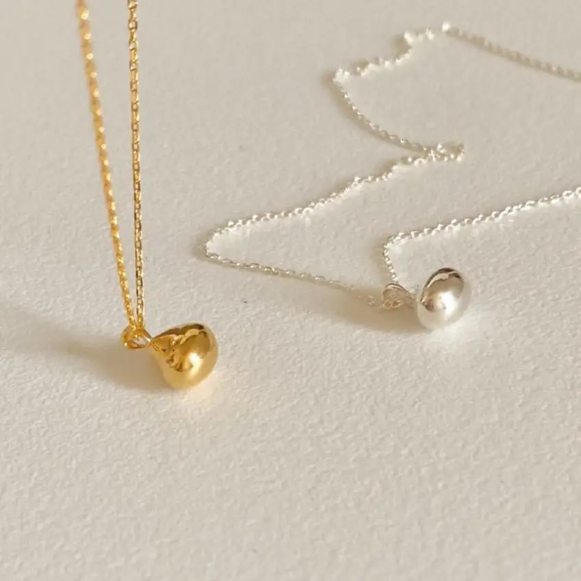 

Подвеска-колье из серебра и золота 18 карат