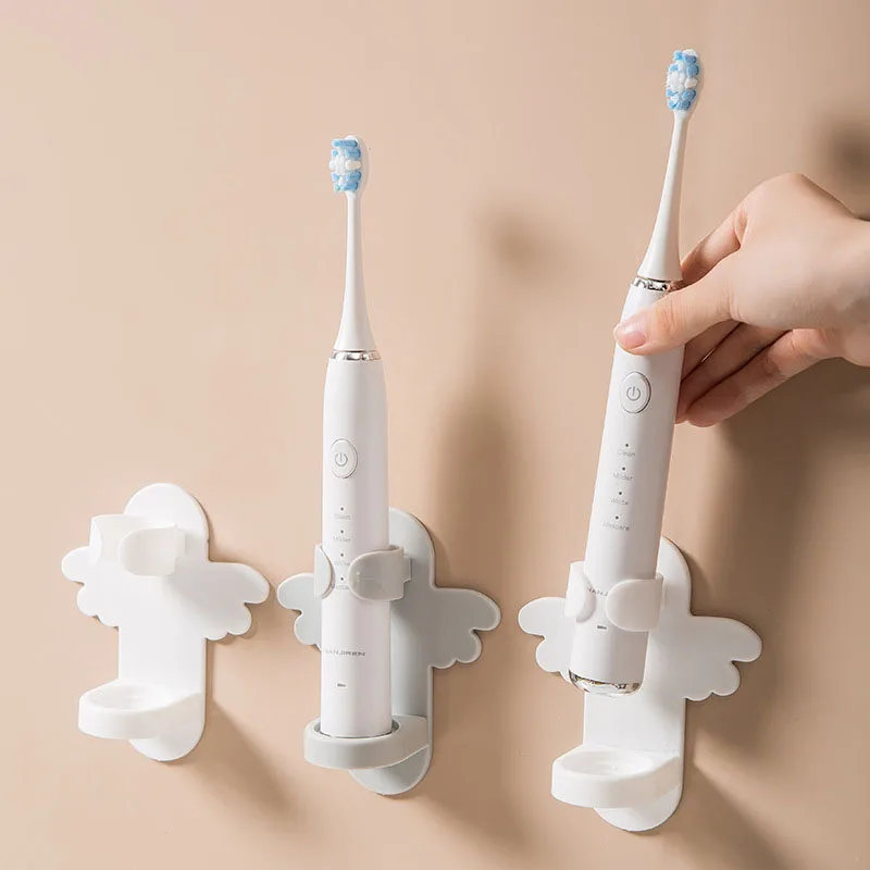 

Electric Toothbrush Holder Wall Mounted Adhesive Clip Stand Punch-free Cartoon Tooth Brush Rack Bathroom Organizer