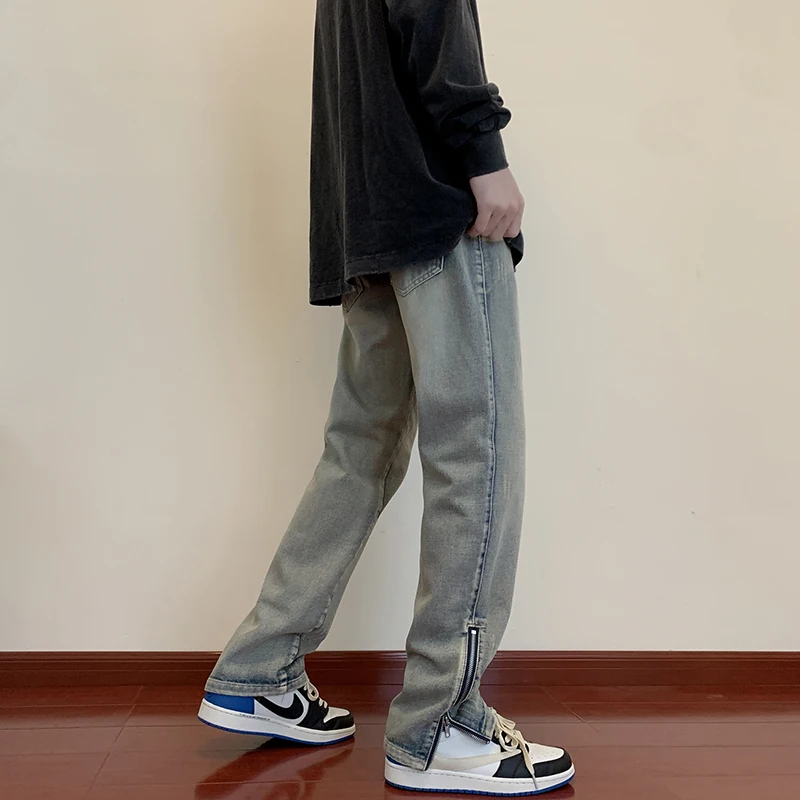 Four Seasons Jeans Men's Fashion Casual Blue Trousers Men's Street Loose Hip Hop Hole Straight Denim Trousers Men's Streetwear