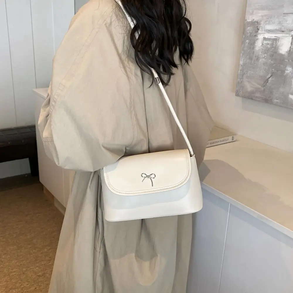 Трендовая дизайнерская сумка для подмышек с бантом однотонная из искусственной