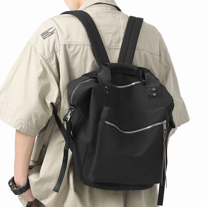 

2023 New Fashion Travel Double Zipper Daily Women Men Backpack Large Pockets High Capacity Students Schoolbags Shoulder Bags