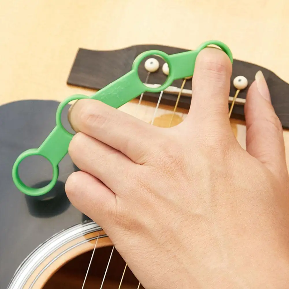 

Musical Instrument Finger Expander Guitar Piano Guzheng Force Finger Erhu Finger Tensioner Span Trainer General Device Expa F7b0