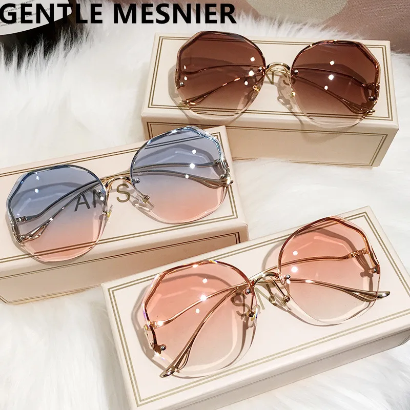 

2022 роскошные круглые градиентные солнцезащитные очки женские металлические изогнутые дужки Модные солнцезащитные очки без оправы для мор...