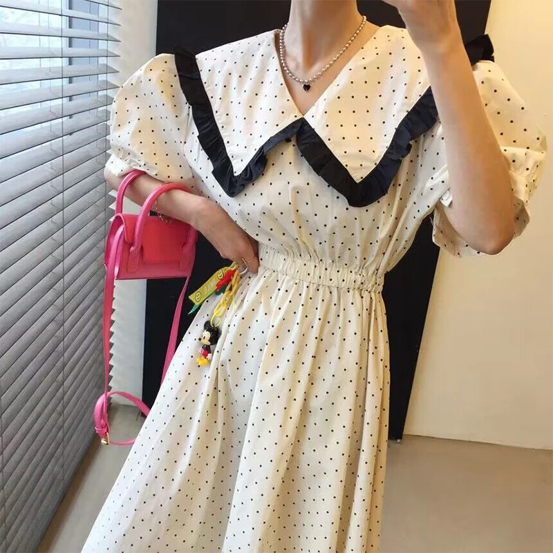 

Clothland Women Sweet Polka Dot Midi Dress Ruffle Peter Pan Collar Short Sleeve White Black Retro Mid Calf Dresses Mujer QC129