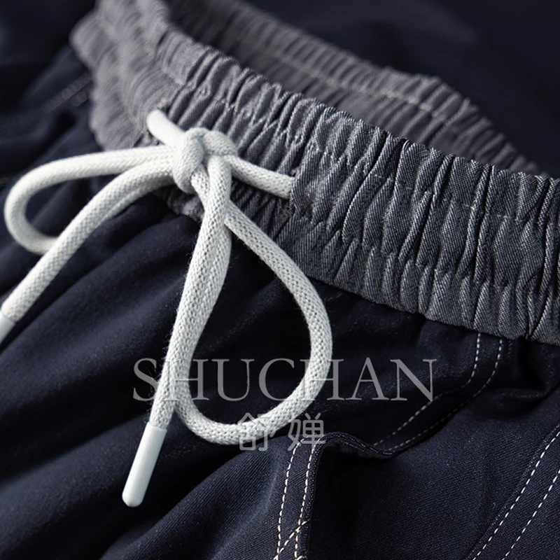 Джинсовые новые синие контрастные цветные эластичные брюки с завышенной талией