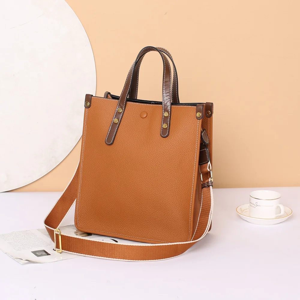 

Nouvelle niche française sac fourre-tout en cuir sac à main sac crossbody sac à la mode cent épaule sac femmes