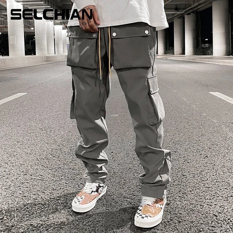 

High Street Multi-pocket Casual Trousers for Men and Women Side Breasted Drawstring Cargo Pants Harajuku Solid Loose Pants
