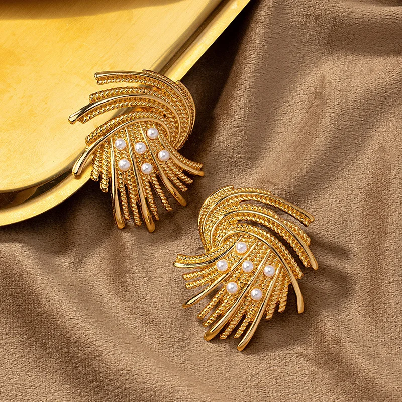 Женские серьги в золотом и серебряном цвете