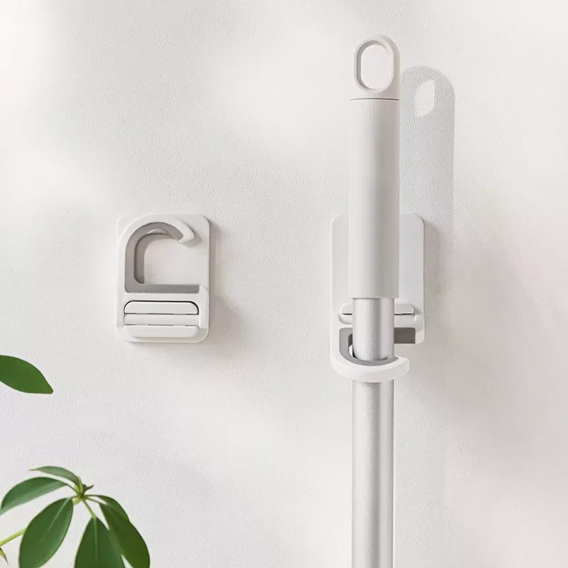 

Wall Mounted Waterproof Dampproof Multi Purpose Broom Hanger 1Pcs White ABS/Silicone Kitchen Bathroom Organizer Japanese Style
