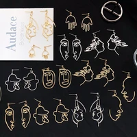 european and american fashion new creativity handmade ins interesting hollowed out palm face pendant earrings for women jewelry