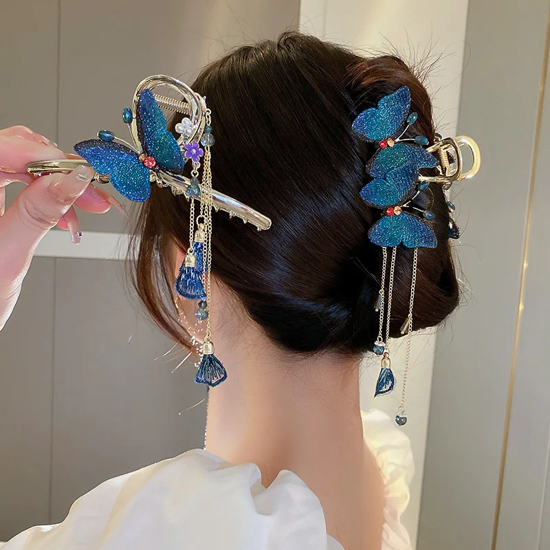 

Женская заколка для волос с кристаллами и голубыми бабочками
