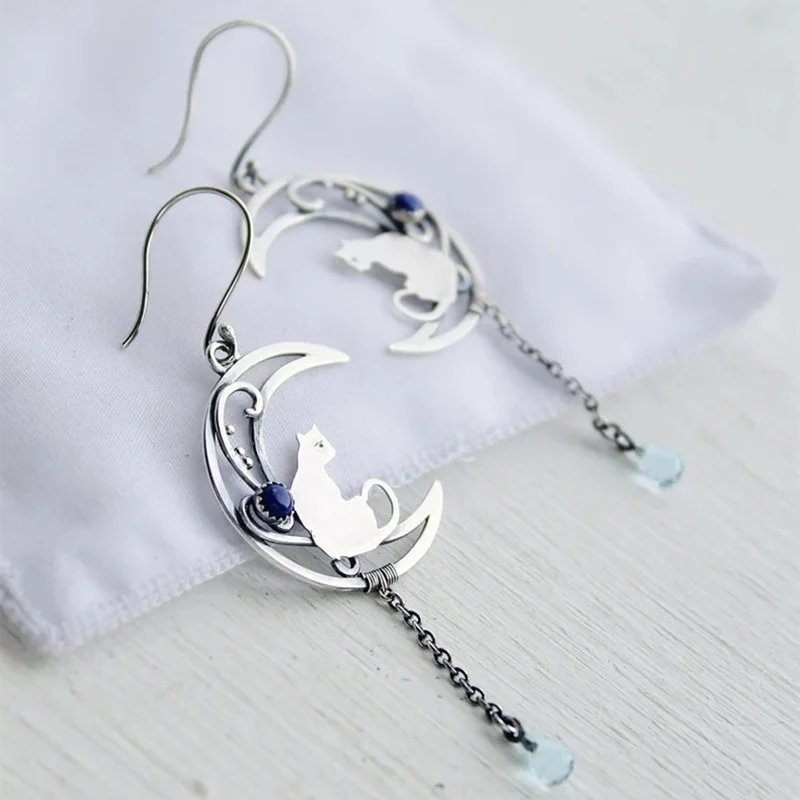 

KYTRD Retro Metal Carving Cat Earrings Fashion Silver Color Moon Handmade Hanging Chain Blue Zircon Dangle Earrings for Women