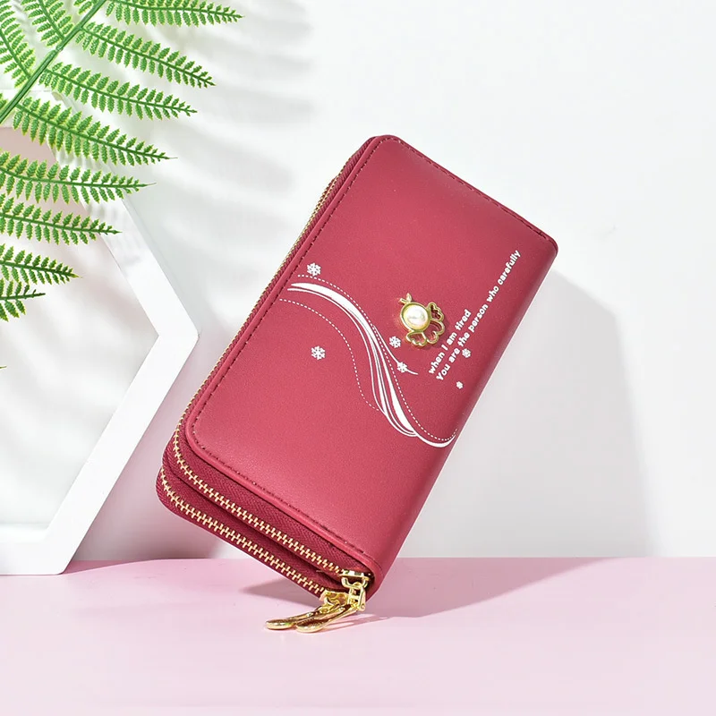 

Double zipper wallet women's long large capacity hand bag student double wallet Korean pearl change mobile phone bag