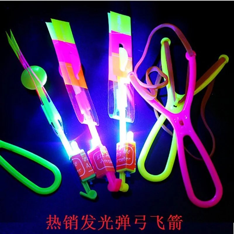100Pcs/lot or 50pcs Amazing Light Toy Arrow Rocket Helicopter Flying LED Toys Party Fun Gift Rubber Band Catapult - купить по