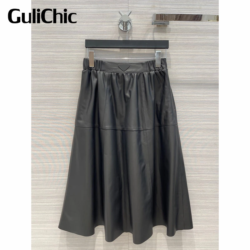 

10.7 GuliChic Women Elegant Vintage Solid Color Elastic High Waist Genuine Leather A-Line Skirt