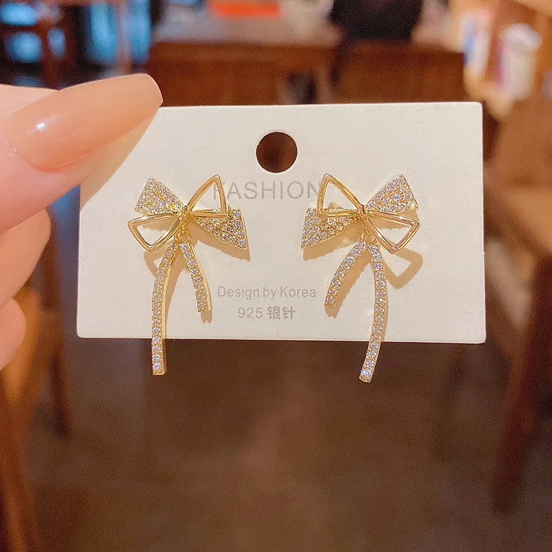 

Wholesale Hot Selling Ribbon Bow Silver Color Drop Earrings Korean Style Women Zircon Bow Rhinestone Bow Ear Studs