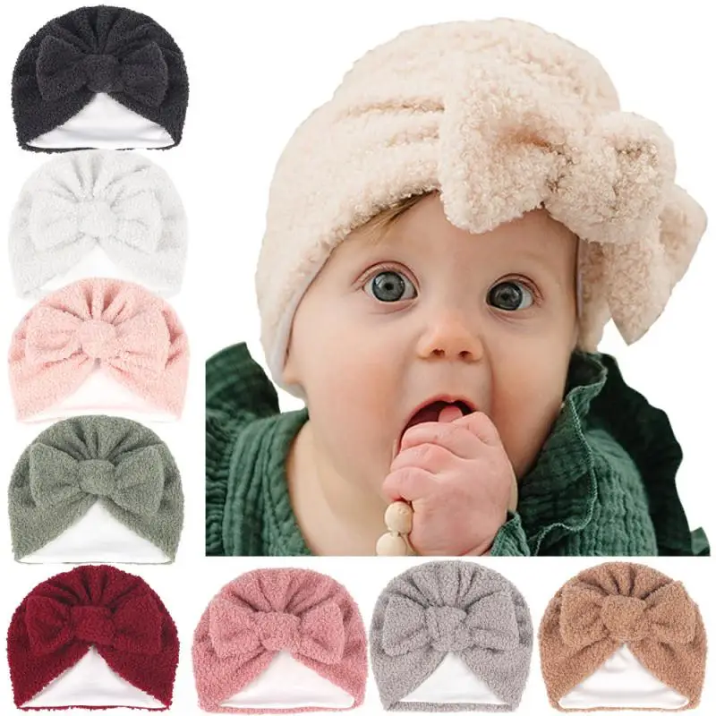 

Baby's Hat Bow Knot Solid Color Teddy Velvet Pullover Hat Newborn Autumn And Winter Warm Double Layer Fluff Thick Hat Dropship