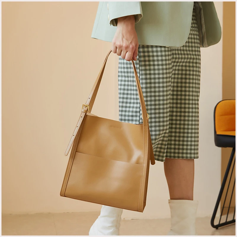 New Leather Women's Bag Bucket Bag Commuter Handbag Niche Design Tote Bag Shoulder Diagonal Bag Women2022